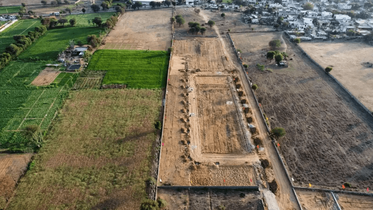 Wide aerial view of plotted township on Ajmer Road–Ring Road growth corridor, Jaipur